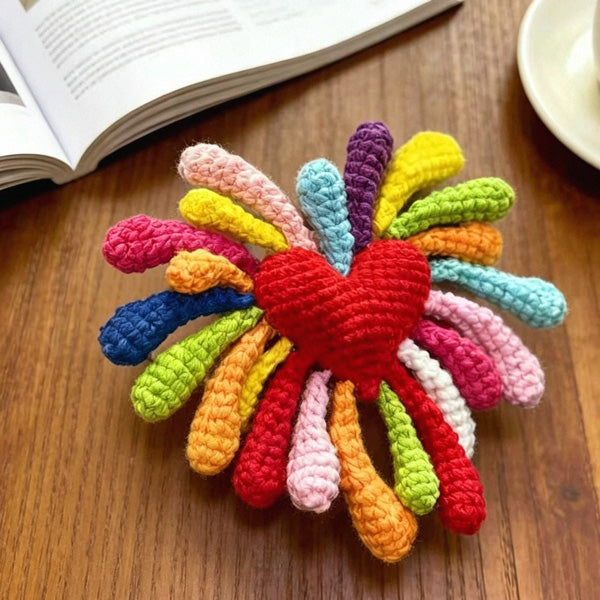Crochet firework flower on wooden desk
