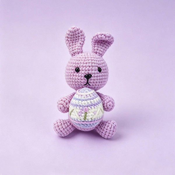 Crochet Easter bunny DIY kit in orange — yarn, hook, safety eyes, wire, stuffing and pattern booklet | Knoblom