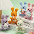 Crochet Easter bunny DIY kit in pink — yarn, hook, safety eyes, wire, stuffing and pattern booklet | Knoblom