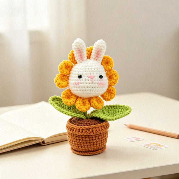 Crochet bunny with sunflower, close-up face detail | Knoblom