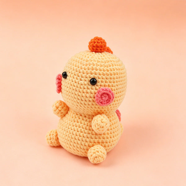 Crochet chick doll side view, approx 9cm wide | Knoblom