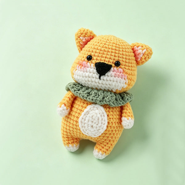 Crochet dog keychain on bag, lifestyle view | Knoblom