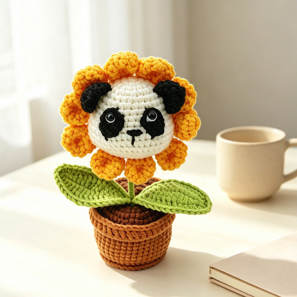 Crochet panda with sunflower, close-up face detail | Knoblom