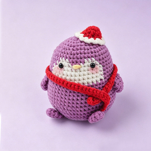 Crochet penguin charm on keys, lifestyle view | Knoblom