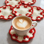 Crochet tulip coaster with scalloped red border, top view | Knoblom
