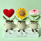 Crochet tulip pot amigurumi in pink, styled on shelf | Knoblom