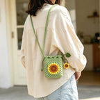 Handcrafted crochet bag with braided strap, side view | Knoblom