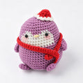 Handcrafted penguin keychain, soft cotton yarn close-up | Knoblom