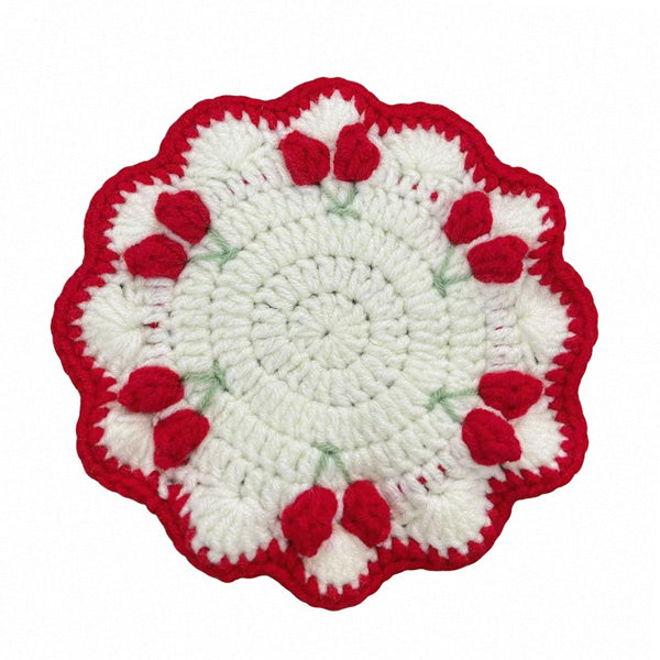 Handcrafted tulip coaster in chunky cotton yarn, close-up | Knoblom