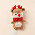 Handmade crochet Christmas reindeer amigurumi in caramel brown with red antlers | Knoblom