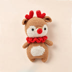 Handmade crochet Christmas reindeer amigurumi in caramel brown with red antlers | Knoblom