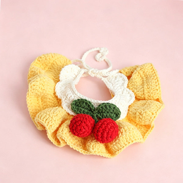 Handmade crochet cherry pet bib collar in yellow — close-up detail