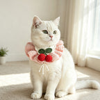 Handmade crochet cherry pet bib collar in yellow on white background