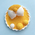 Handmade crochet duck phone stand in mustard yellow and cream | Knoblom