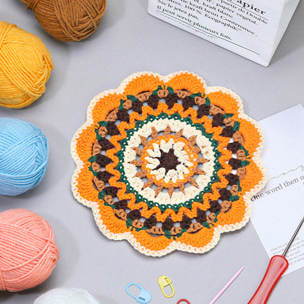 Handmade crochet golden bloom sunflower coaster in golden yellow and green
