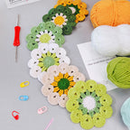 Handmade crochet green and yellow mandala coaster on green background