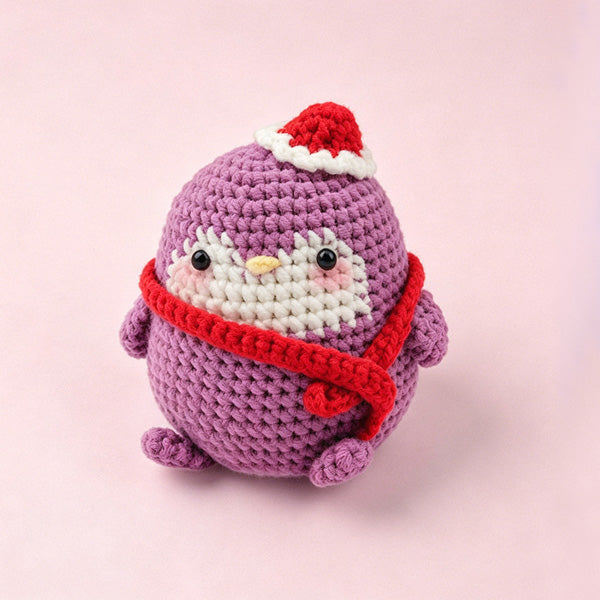 Handmade crochet penguin keychain in red scarf and Santa hat, approx 10cm | Knoblom