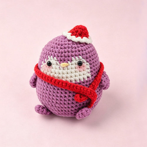 Handmade crochet penguin keychain in red scarf and Santa hat, approx 10cm | Knoblom