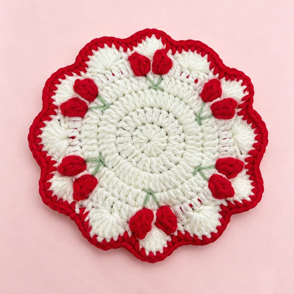 Handmade crochet tulip coaster with red tulip buds on cream base | Knoblom